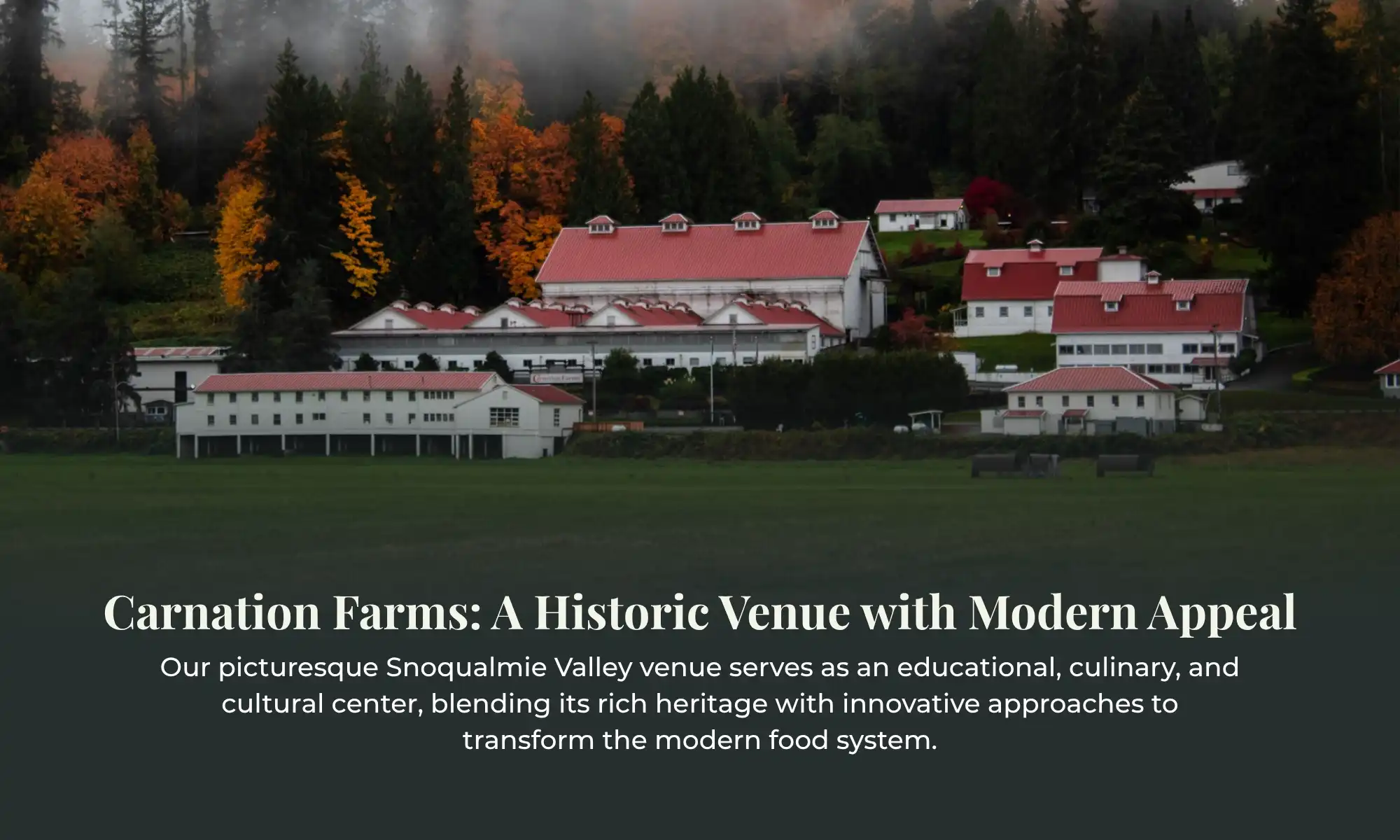 Historic Venue Carnation Farms | Carnation Farms Aerial view of Carnation Farms historic red-roofed buildings in Snoqualmie Valley