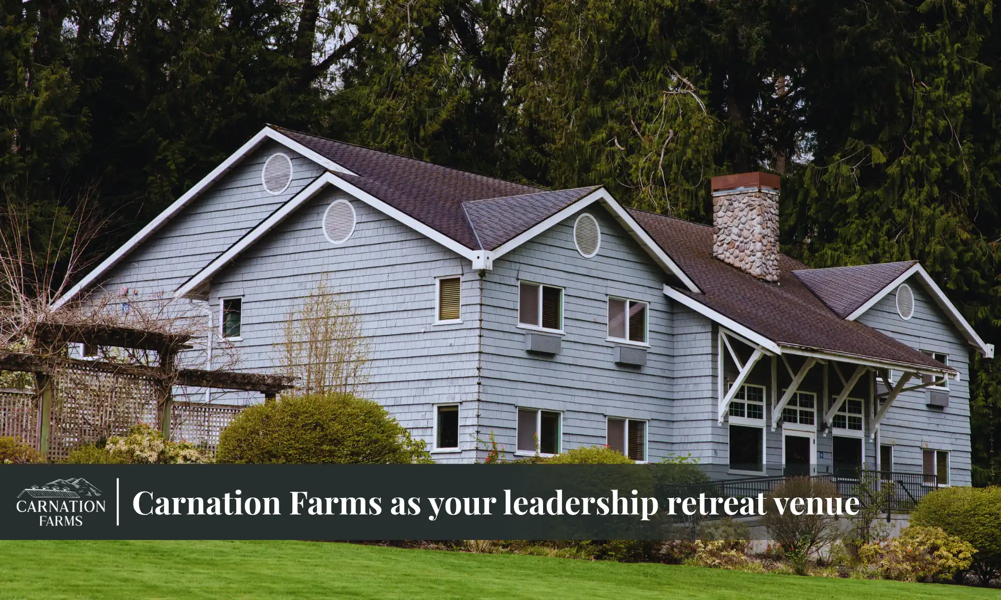 Planning Leadership Retreat | Carnation Farms Grey lodge building at Carnation Farms surrounded by trees and greenery